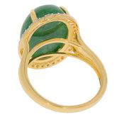 Elegant oval green jadeite ring in sterling silver, showcasing a luxurious design and sparkling gemstone accents.
